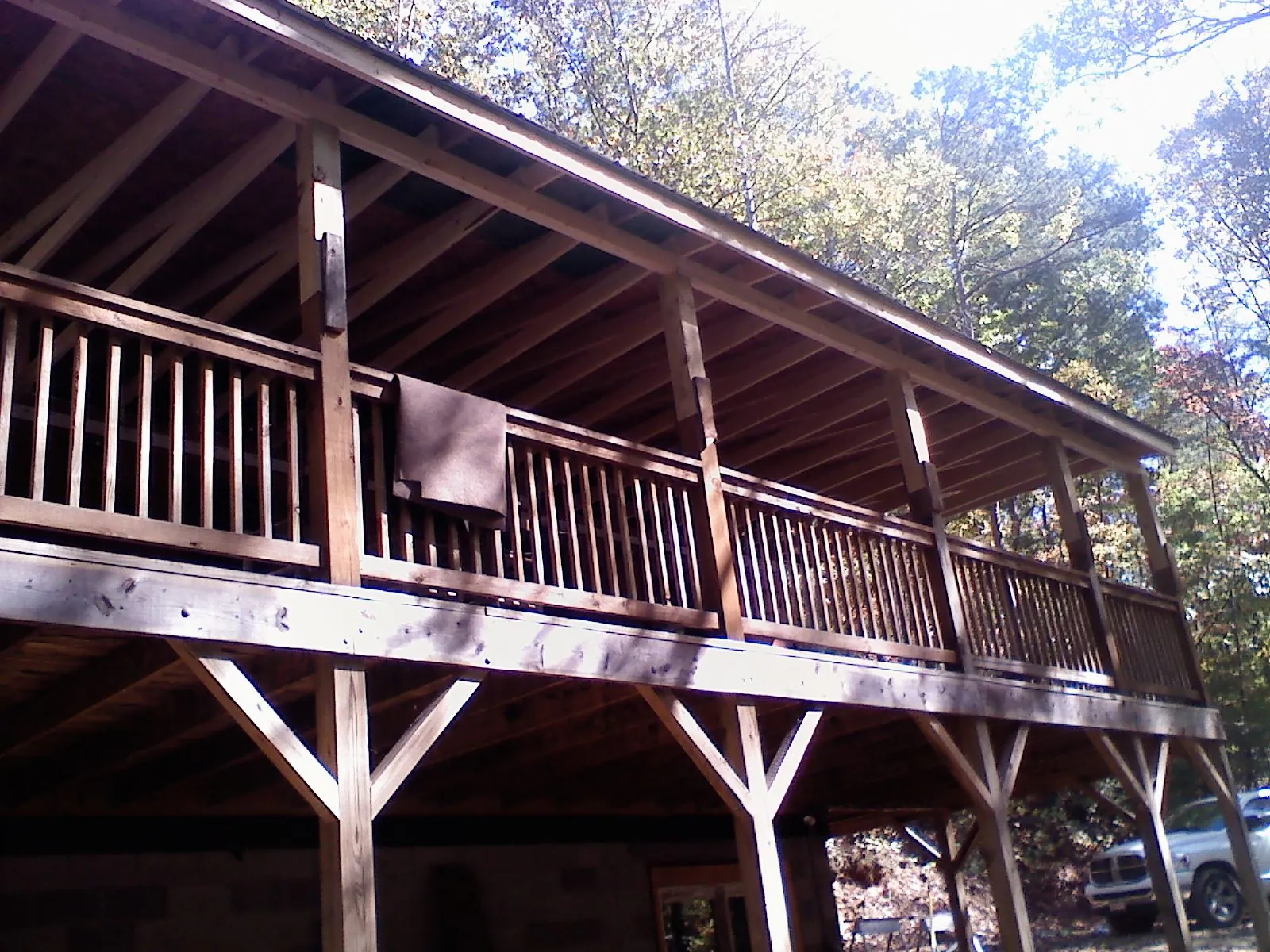 Timber framing under a new elevated porch and deck — Roof Leak Repair in West Barnstable by Roofing Brothers